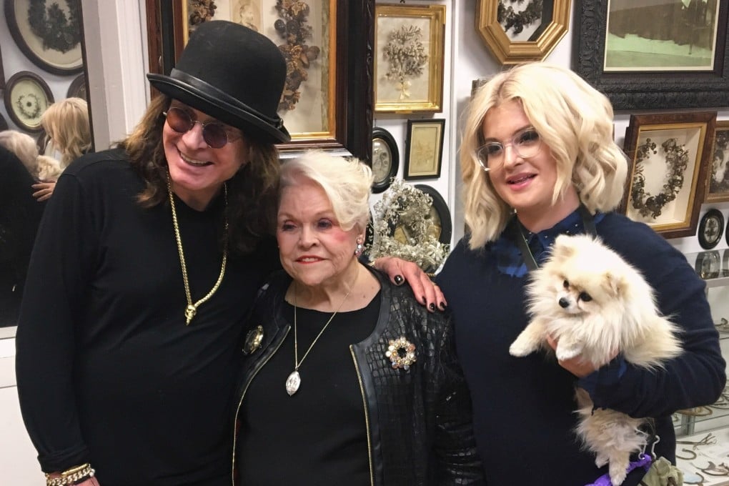Leila Cohoon (centre), founder of Leila’s Hair Museum in Independence, in the US state of Missouri, poses with Ozzy and Kelly Osbourne at the museum in March 2018. Photo: AP