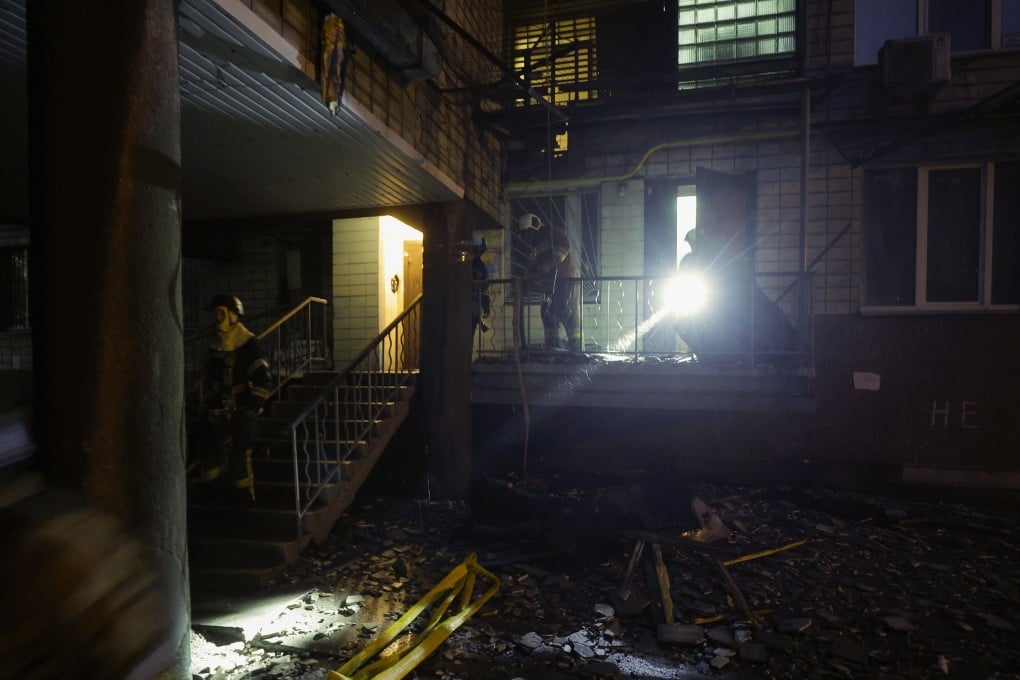Crews work at the site of a Russian strike on a residential building in Kyiv, Ukraine on Friday. Photo: EPA