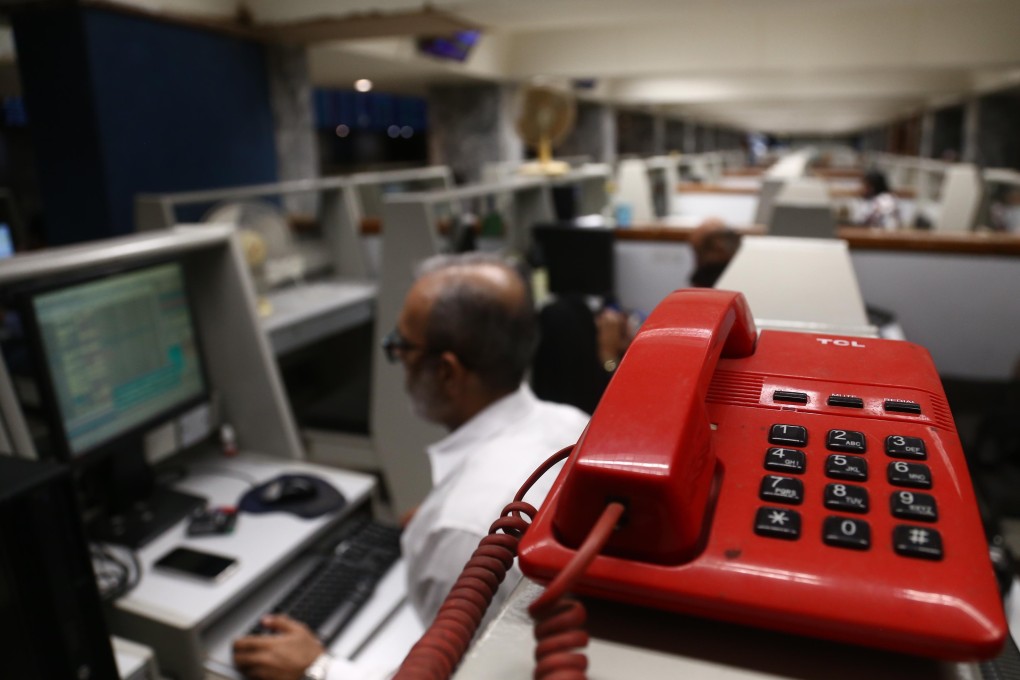 Traders monitor prices at the Pakistan Stock Exchange in Karachi, Pakistan. Photo: EPA