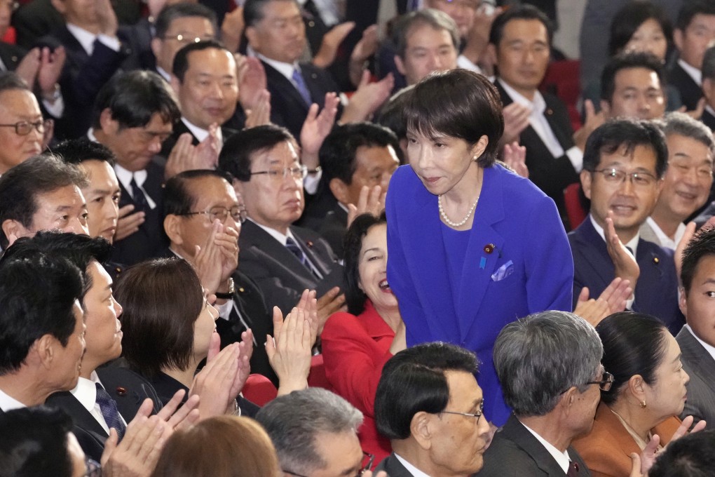Japan’s Sanae Takaichi receives applause at the LDP’s headquarters in Tokyo after winning the party’s presidential election on October 4. Photo: Kyodo