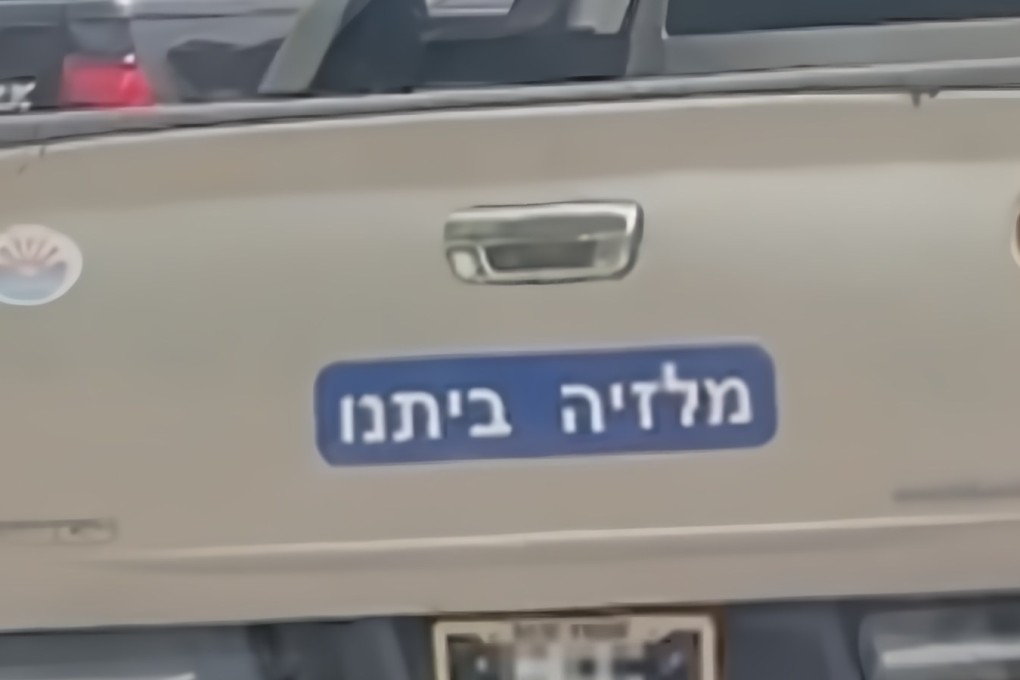 An image of the truck’s sticker, which translates to ‘Malaysia is our home’. Photo: X