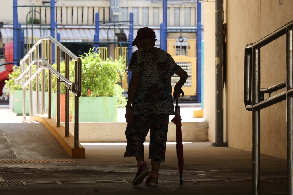 An elderly man walks through Oi Man Estate in Ho Man Tin. The ombudsman earlier found some care homes offering respite services were unduly selective when admitting applicants and were underused. Photo: Jelly Tse