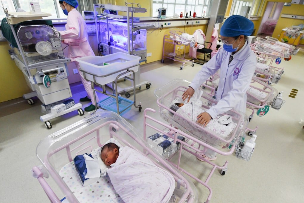 A newborn baby is cared for in a Chinese hospital’s neonatal care centre. Photo: SOPA Images