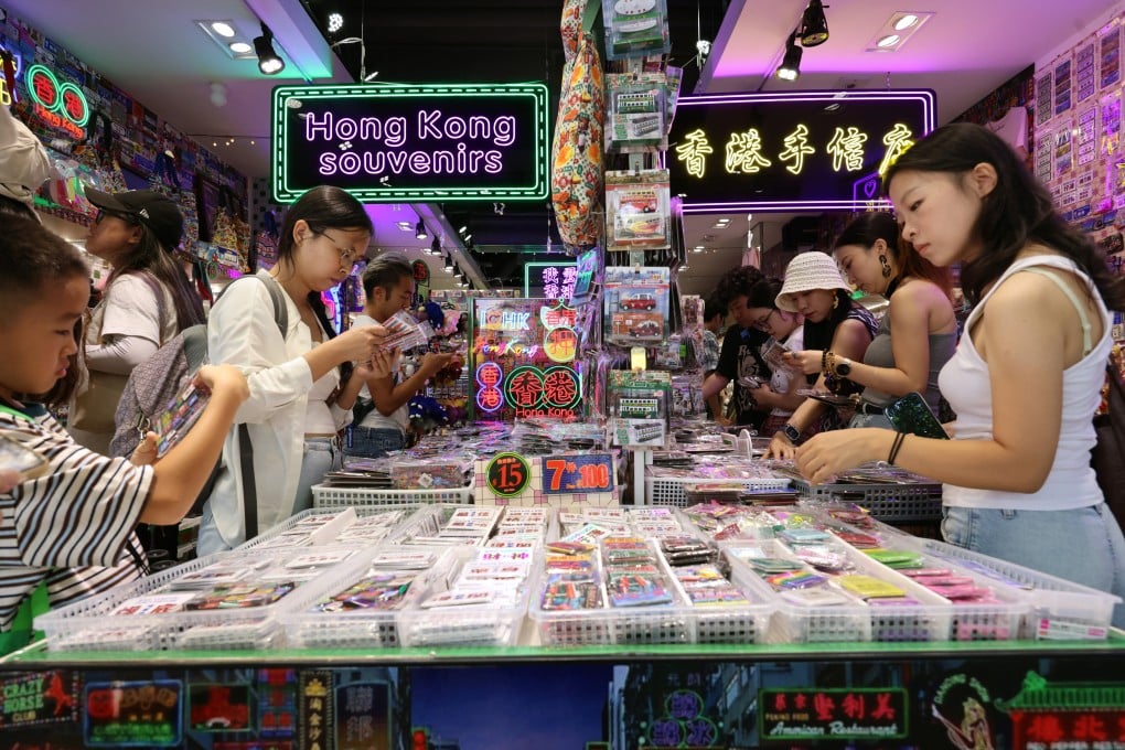 Mainland Chinese tourists check items at a souvenir shop in Tsim Sha Tsui during the National Day “golden week” holiday. Photo: Jelly Tse