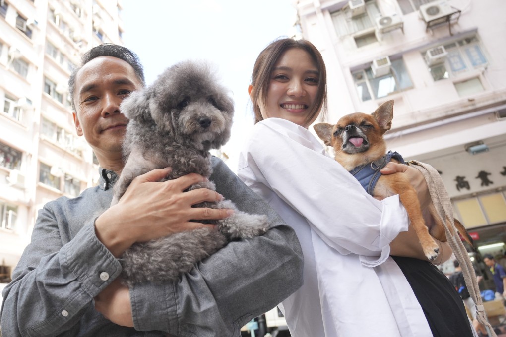 Au Cheuk-man, director of the film Paws Land, and singer Cath Wong with their adopted dogs, Daniel and Moon Moon, in Jordan. Photo: May Tse