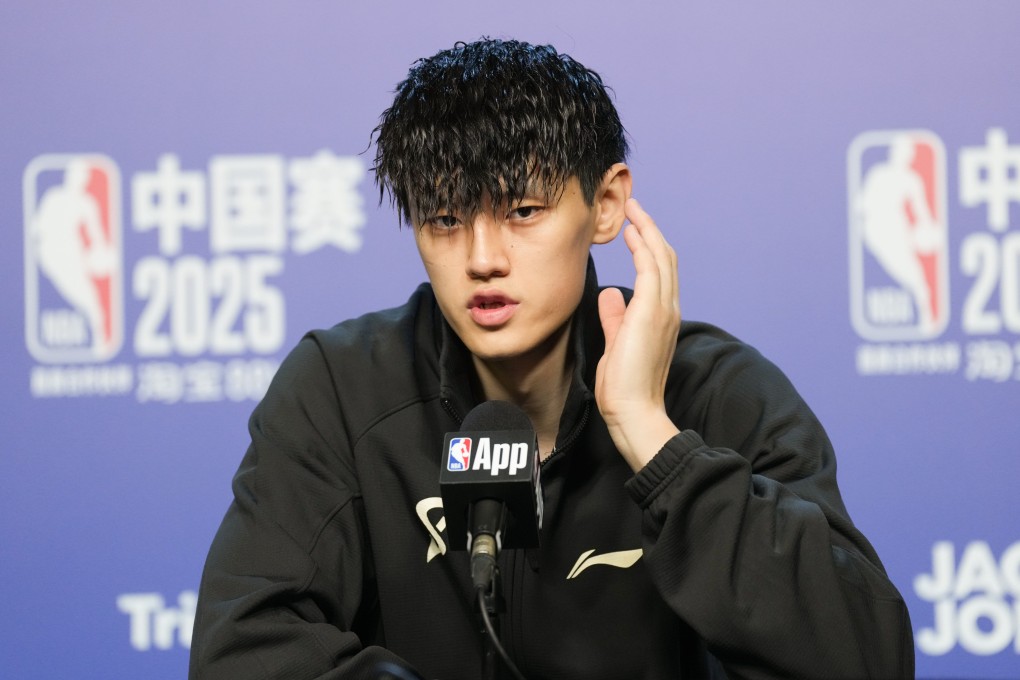 Brooklyn Nets player Zeng Fanbo speaks to the media after making his debut against the Phoenix Suns in Macau. Photo: Karma Lo