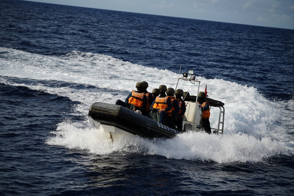 Law enforcers of the China Coast Guard conduct a mission last month in the South China Sea. Photo: Xinhua