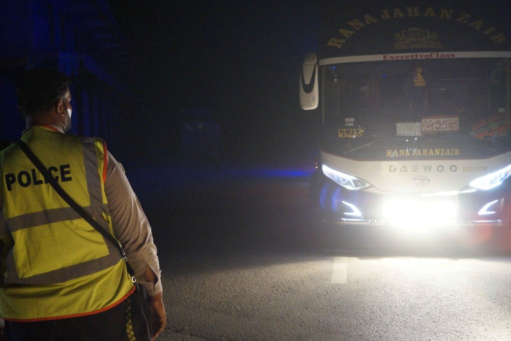 Pakistani police block set up a blockade as suspected militants attack a police station in Dera Ismail Khan on Friday night. Photo: EPA
