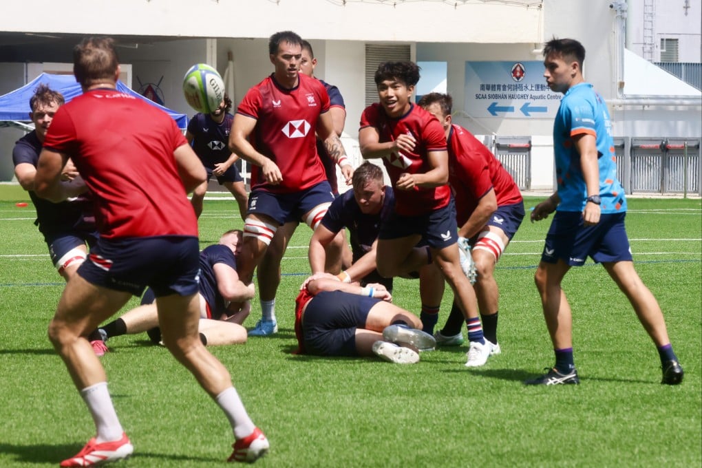 Scrum-half Eric Chui (centre) was “going well” against the Japanese side before going off with an injury. Photo: Jonathan Wong