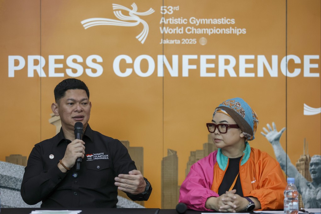 President of Indonesian National Olympics Committee Raja Sapta Oktohari (left) speaks next to the president of Indonesian Gymnastic Federation Ita Yuliati ahead of the 53th Artistic Gymnastics World Championships. Photo:  EPA