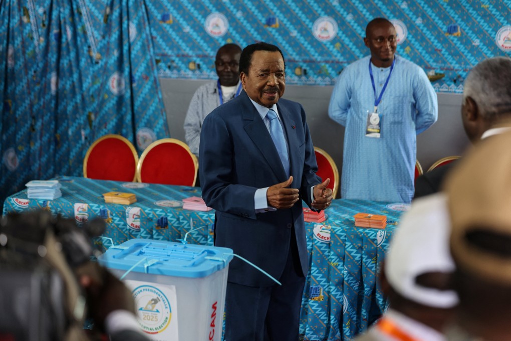 Cameroonian President Paul Biya, 92, reacts on Sunday after he casts his ballot during the presidential election. Photo: Reuters