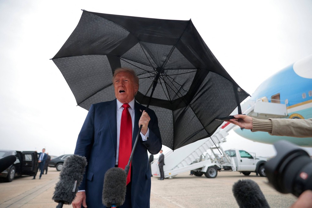 US President Donald Trump speaks to journalists before boarding Air Force One for a trip to the Middle East on Sunday at Joint Base Andrews, Maryland. Photo: Getty Images via AFP
