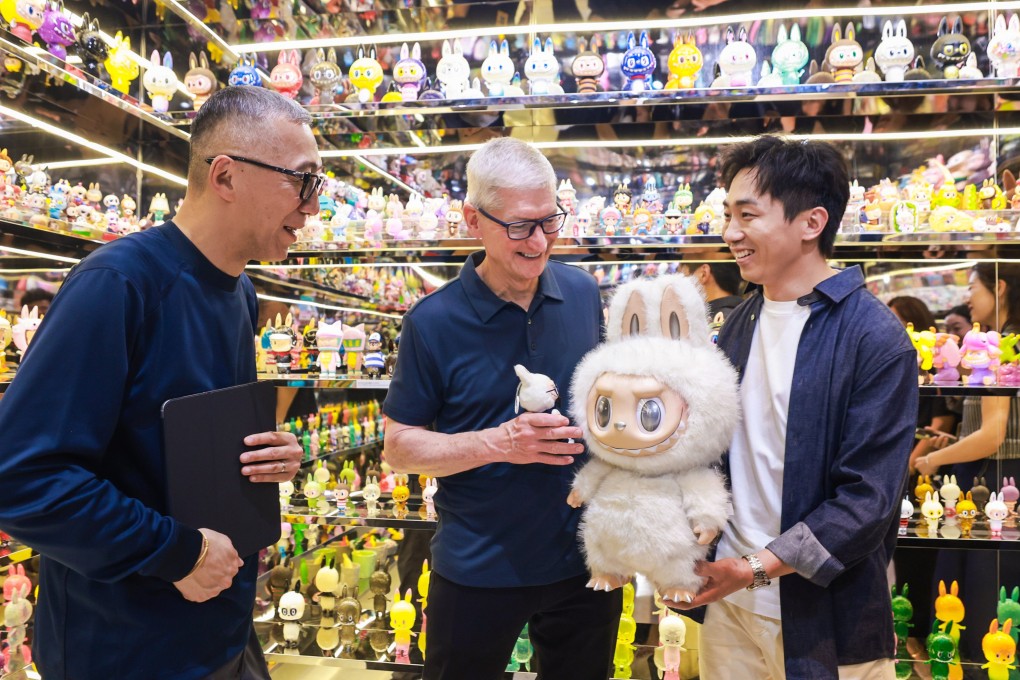 Labubu creator Kasing Lung (left), Apple CEO Tim Cook and Pop Mart CEO Wang Ning meet at a Labubu exhibition in Shanghai on Monday. Photo: Handout