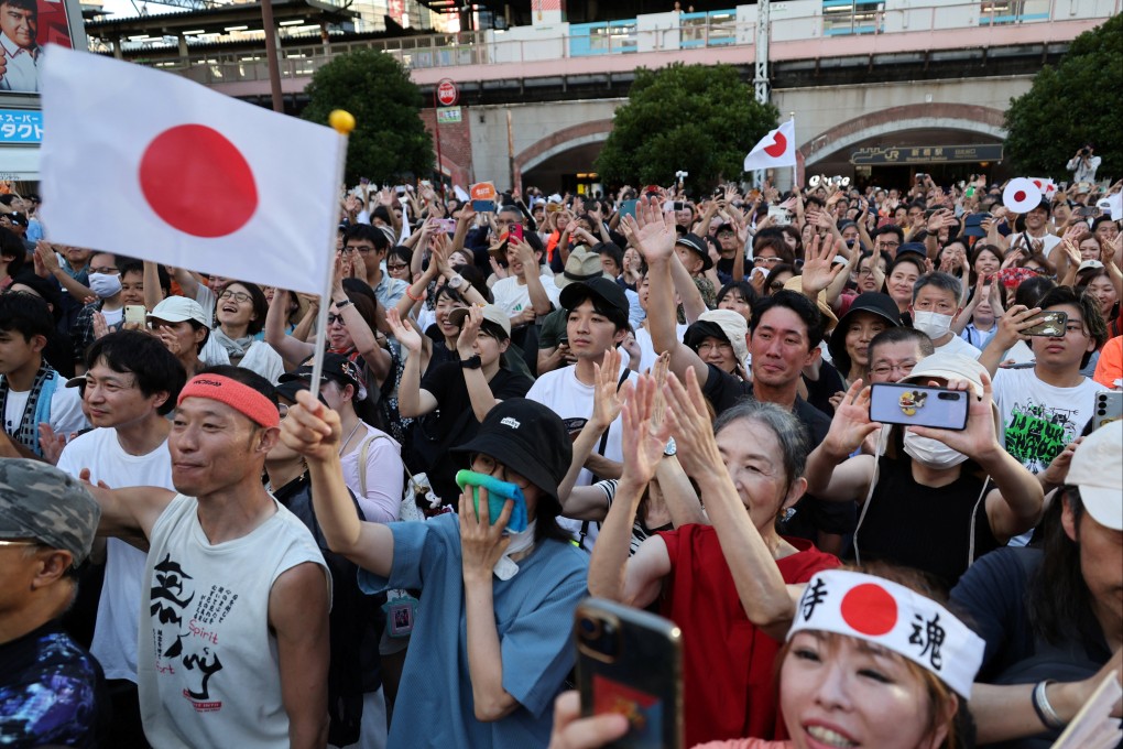 Supporters of Japan’s Sanseito party leader react during the party’s rally in Tokyo on July 21. Photo: Reuters