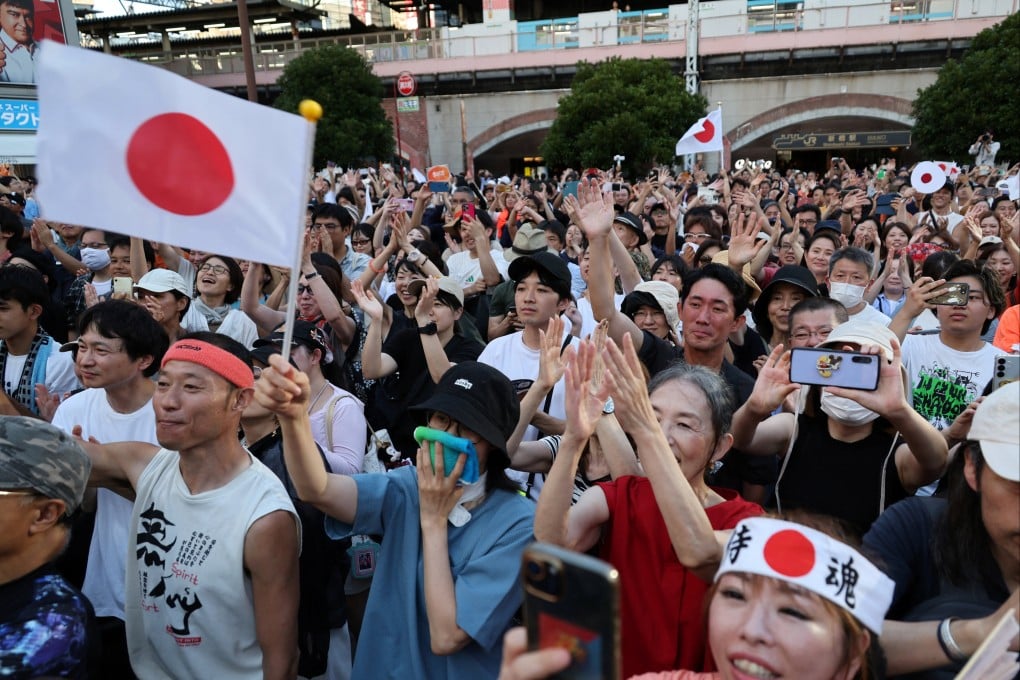 Supporters of Japan’s Sanseito party leader react during the party’s rally in Tokyo on July 21. Photo: Reuters