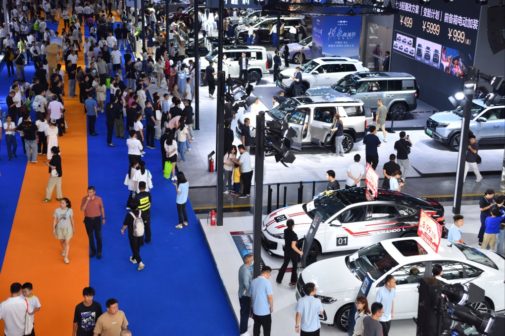 Visitors view cars displayed at an automobile consumption promotion event held in Changsha, in central China’s Hunan province, on October 1, 2025. Photo: Xinhua