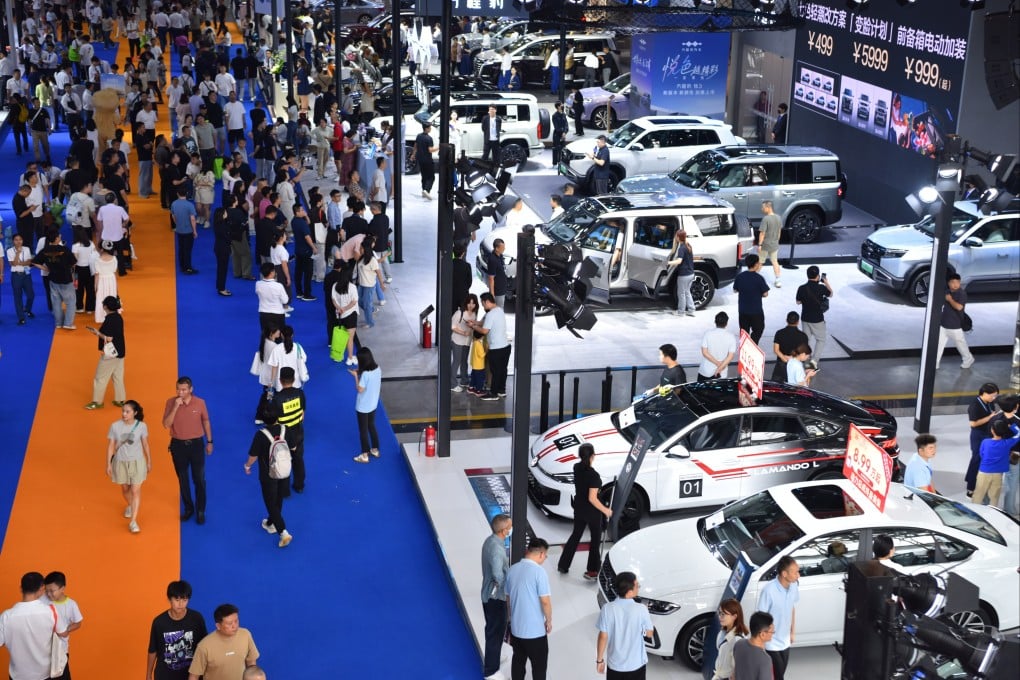 Visitors view cars displayed at an automobile consumption promotion event held in Changsha, in central China’s Hunan province, on October 1, 2025. Photo: Xinhua