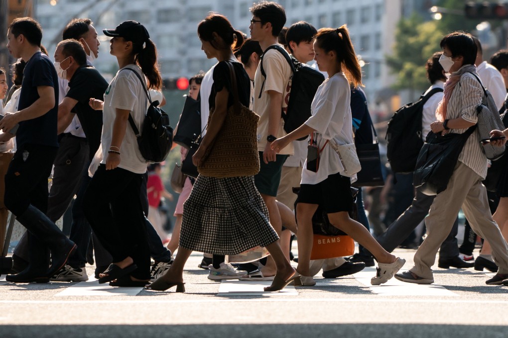Pedestrians walk along the Ameyoko shopping street in Tokyo, Japan. Photo: Getty Images