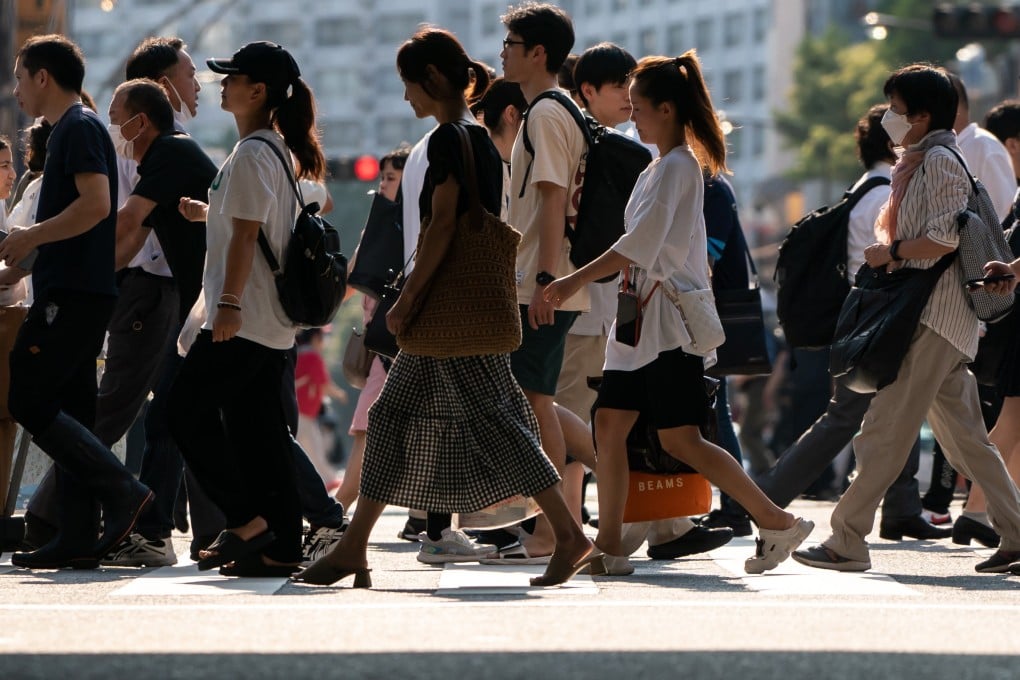 Pedestrians walk along the Ameyoko shopping street in Tokyo, Japan. Photo: Getty Images