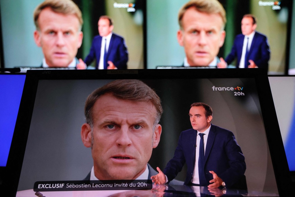 Television screens displaying France’s Prime Minister Sebastien Lecornu with an image of France’s President Emmanuel Macron in the background, during a broadcast last week. Photo: AFP
