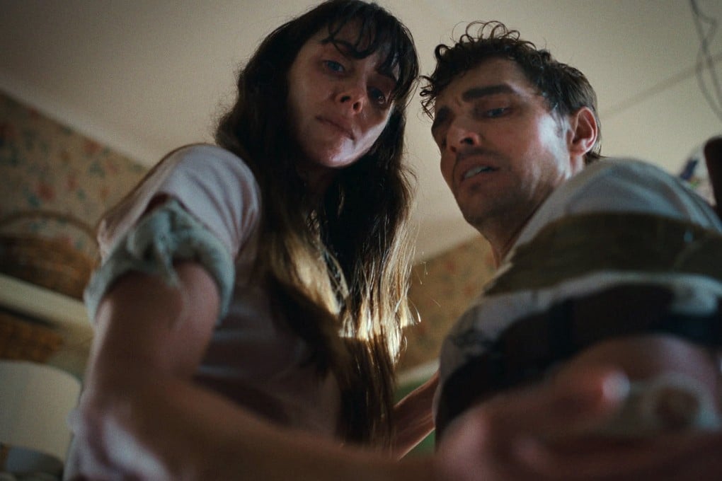 Alison Brie and Dave Franco in a still from Together. Photo: Neon