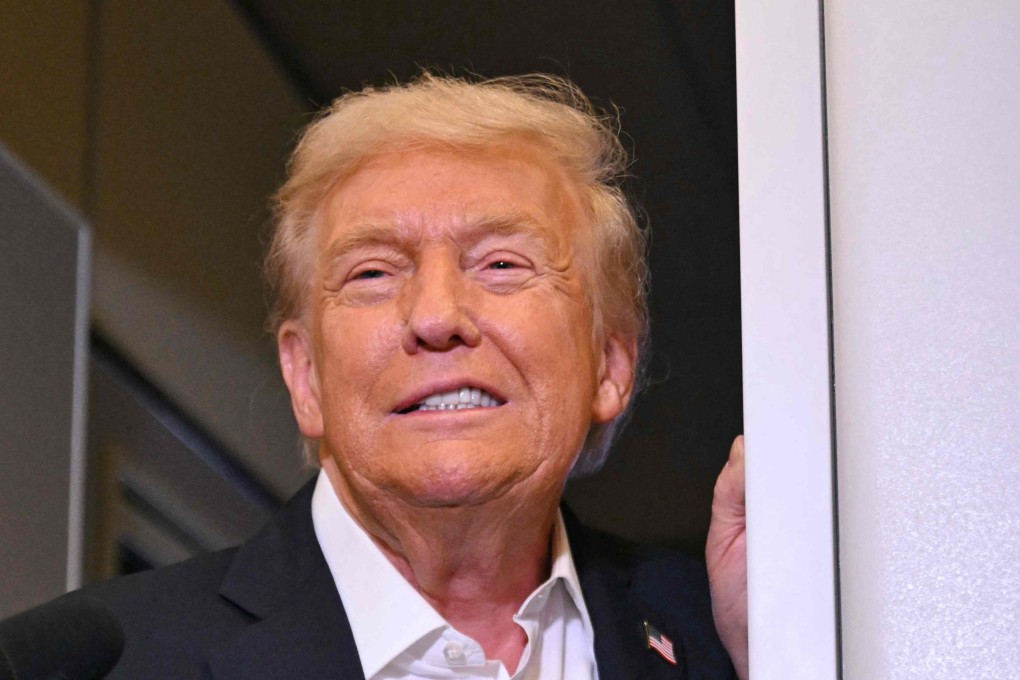 US President Donald Trump speaks with the press on board Air Force One on Thursday. Photo: AFP