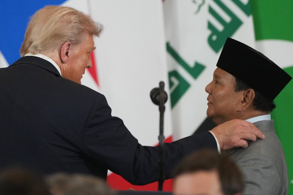 US President Donald Trump (left)  and Indonesian President Prabowo Subianto talk on the sidelines of the Gaza peace summit in Egypt, not realising both are still miked up, on Monday. Photo: AP