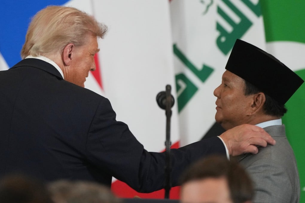US President Donald Trump (left) and Indonesian President Prabowo Subianto talk on the sidelines of the Gaza peace summit in Egypt, not realising both are still miked up, on Monday. Photo: AP