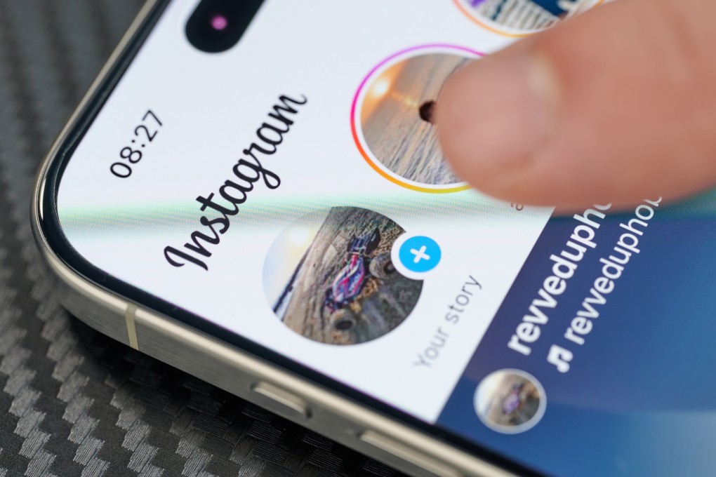 A social media user watching stories on Instagram. Photo: Shutterstock