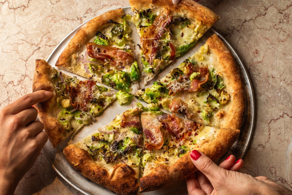 A Brussels sprouts-topped creation at Emmer Pizzeria. Photo: Emmer Pizzeria