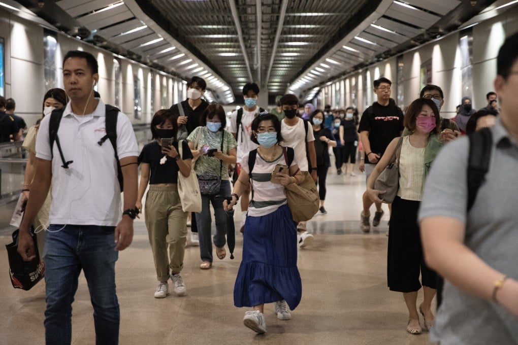 People walk in an underground MRT train station in Singapore. The government reiterates its stance in parliament on Tuesday against the politics of race and religion. Photo: EPA-EFE