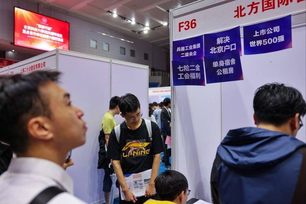 Jobseekers attend a career fair in Beijing. Chinese workers have long complained of a “curse of 35”, where people struggle to get hired after hitting their mid-30s. Photo: Getty Images
