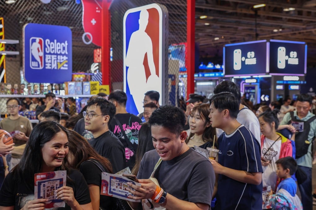 Fans queue at a stall inside the NBA House outside The Venetian Arena in Macau. Photo: Reuters