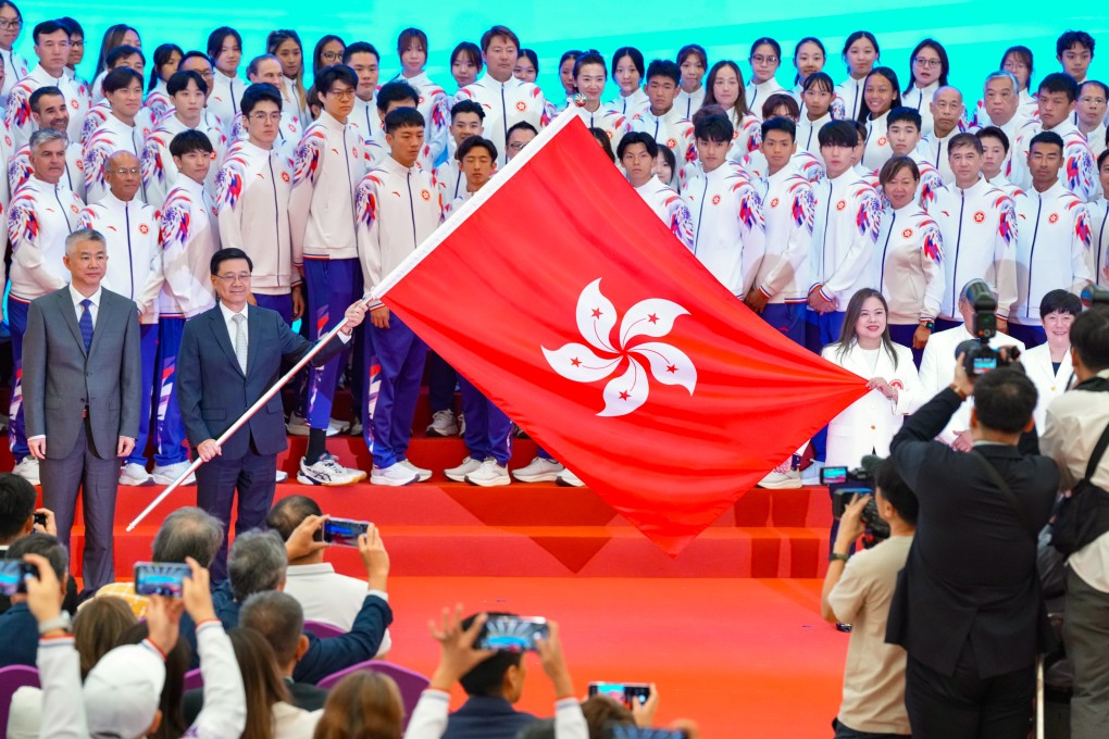 Front row from left: Sun Shangwu, deputy director of the central government’s liaison office in Hong Kong; Chief Executive John Lee and Rosanna Law, Secretary for Culture, Sports and Tourism and head of the Hong Kong delegation. Photo: Karma Lo