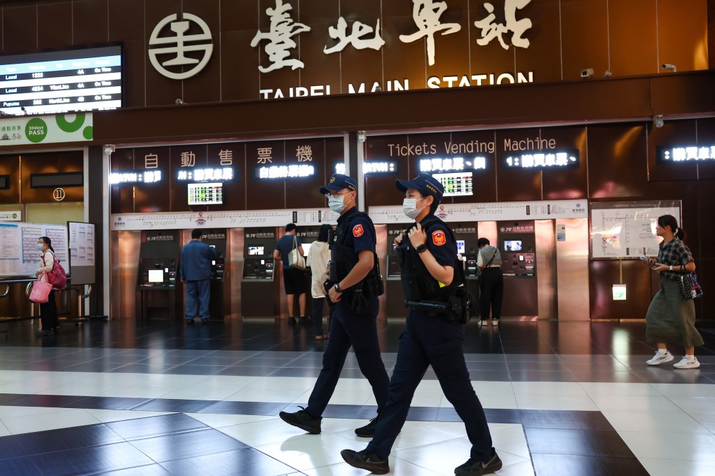 Police officers patrol Taipei Main Station as part of enhanced procedures in the wake of the assault. Photo: CNA
