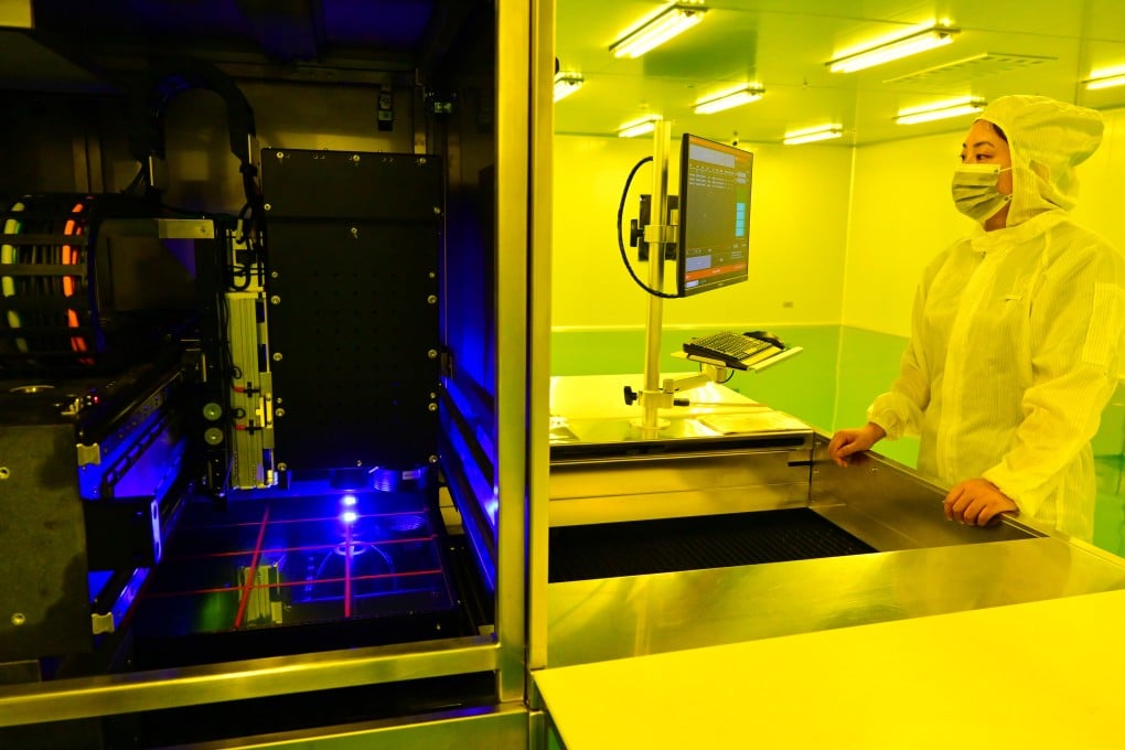 An employee works at a factory producing semiconductor materials in China’s eastern Zhejiang province. China is channelling more funding to support domestic innovation amid the trade war. Photo: Getty Images