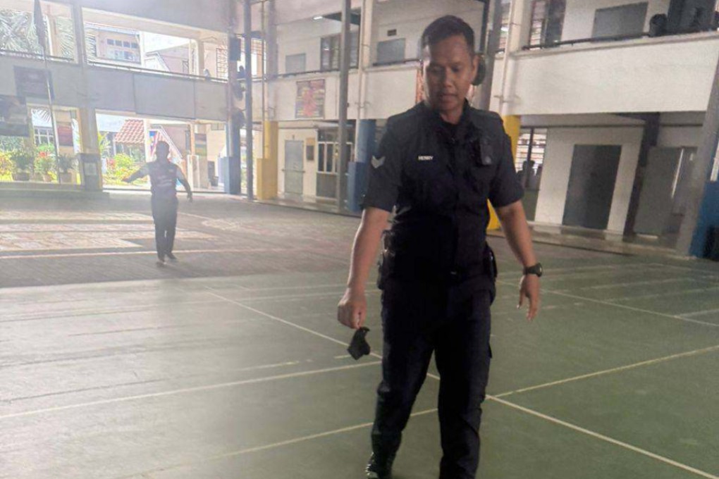 Police at the school, where a girl was stabbed to death in Bandar Utama, Malaysia. Photo: Facebook/NGOGreenProjectMalaysia