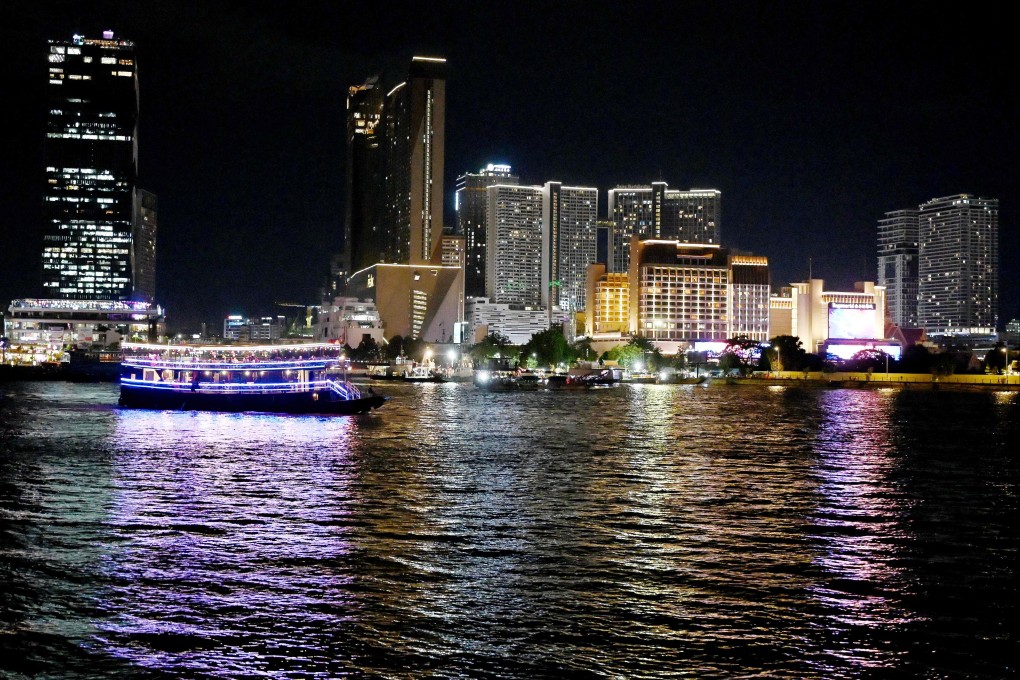A tourist boat sails along the Mekong River in Phnom Penh. A South Korean woman featured in a Cambodian government video said life in the country is “peaceful”. Photo: AFP