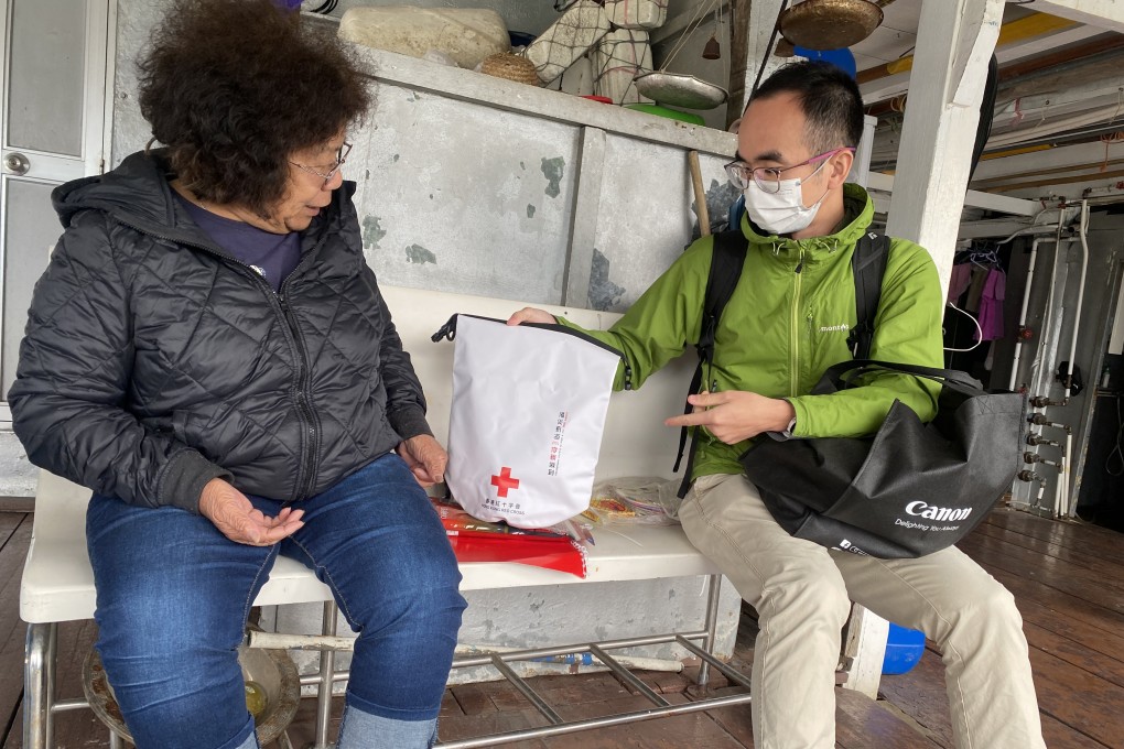 Volunteers from the Hong Kong Red Cross Local Disaster Management Team deliver emergency supplies to Tai O residents to help them prepare for extreme weather. Photo: Handout