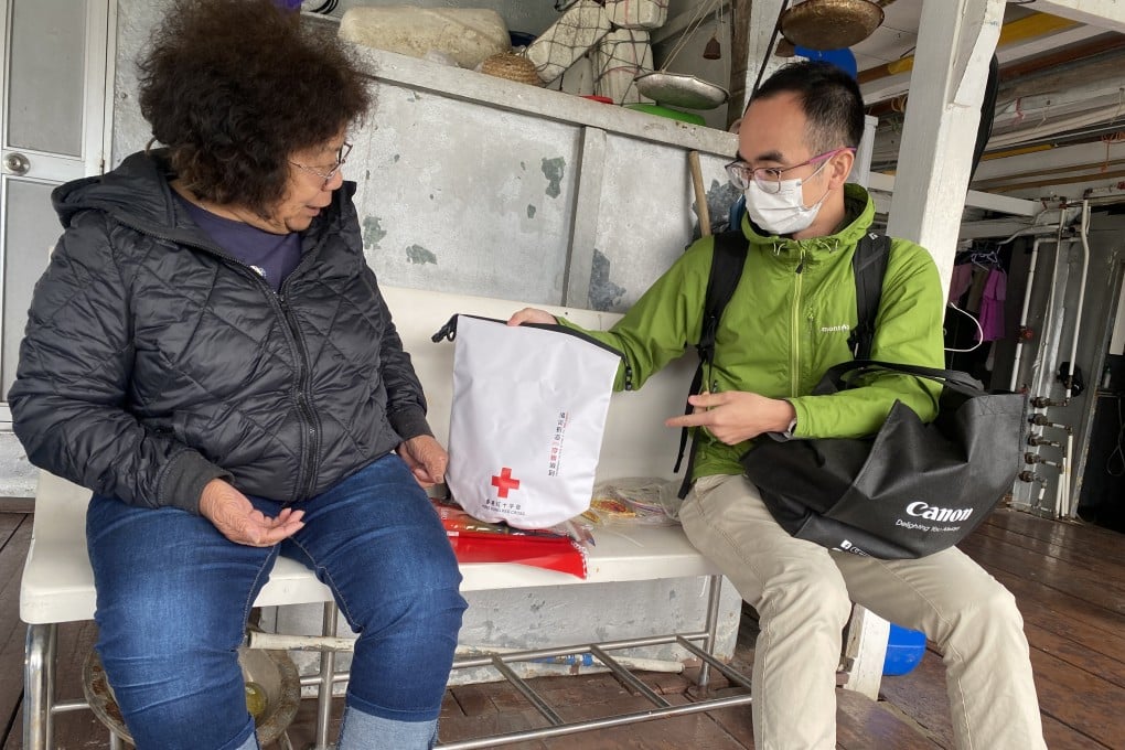 Volunteers from the Hong Kong Red Cross Local Disaster Management Team deliver emergency supplies to Tai O residents to help them prepare for extreme weather. Photo: Handout