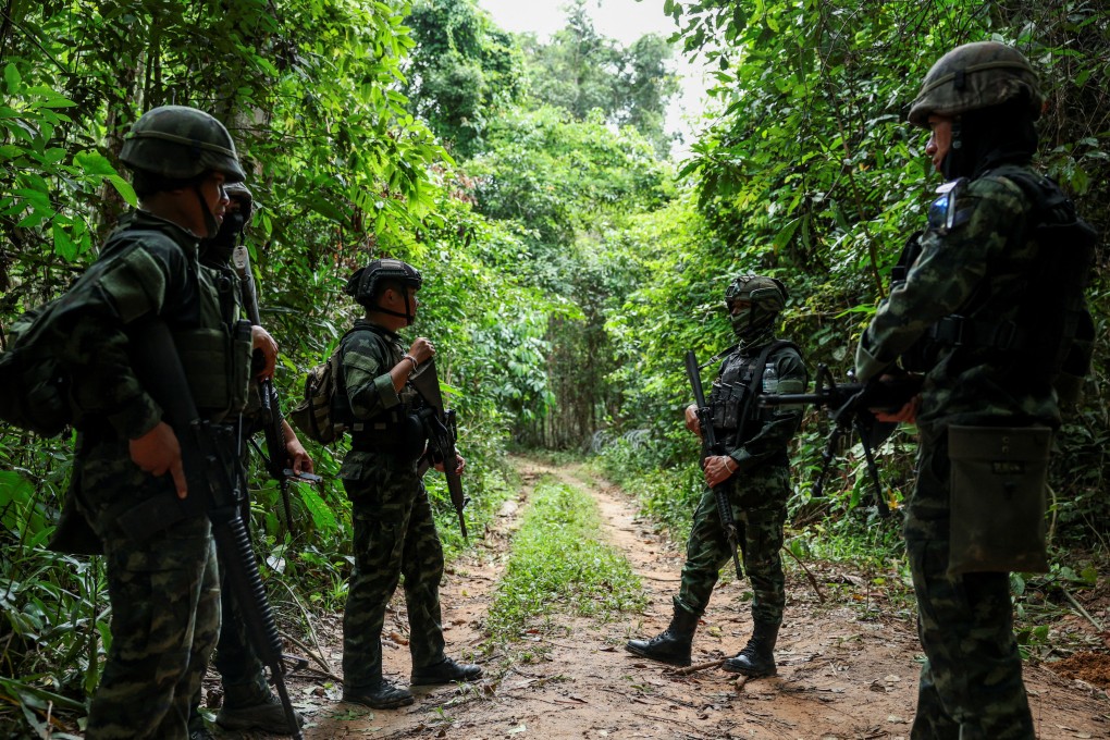 Thai soldiers stand near the country’s disputed border with Cambodia in the Chong Bok area in August. Photo: Reuters