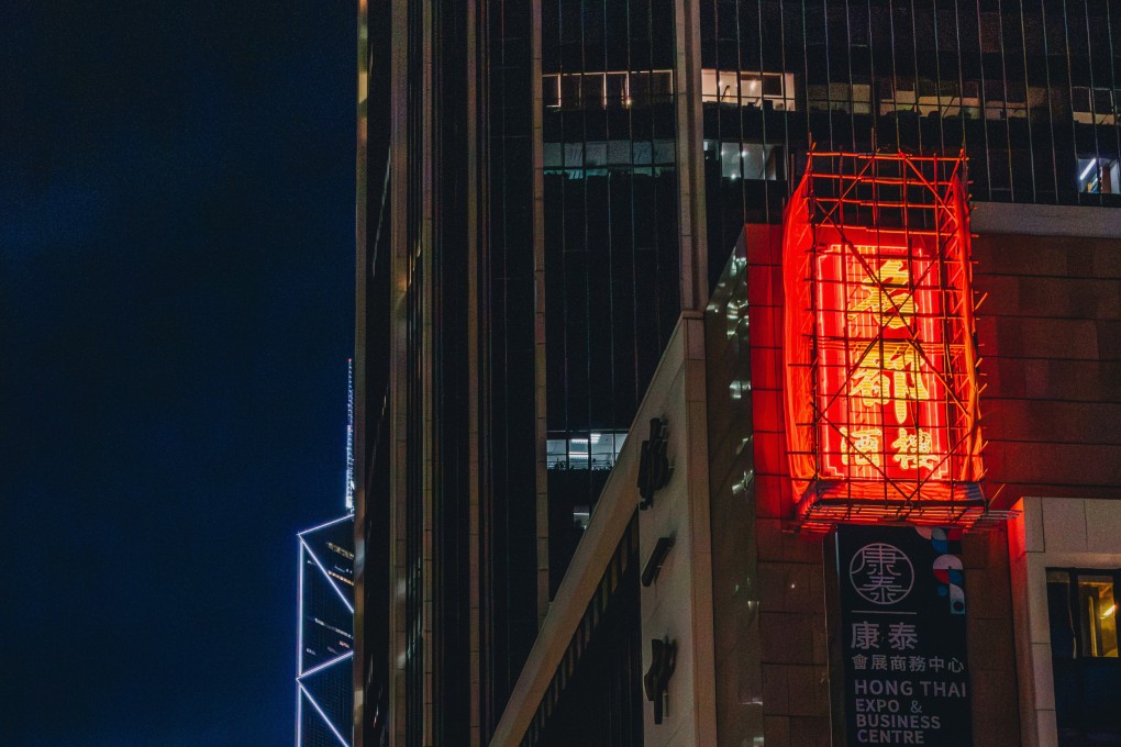 The moment the Metropol’s neon sign, which hadn’t been lit up for years, is turned on one last time, on the evening of September 26, a day before the restaurant in Admiralty, Hong Kong, closed. Photo: Jocelyn Tam