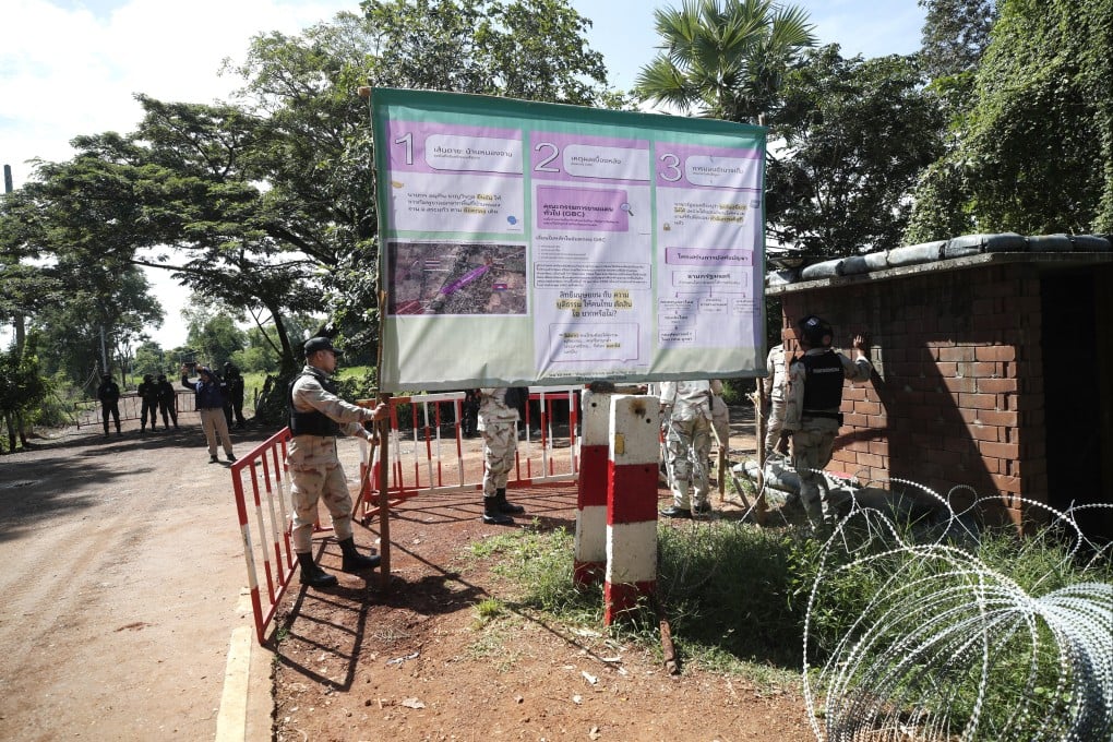 Thai soldiers install a billboard prior to a law enforcement operation to remove Cambodian settlers accused of encroaching on Thai territory, in Ban Nong Ya Kaew, Khok Sung district, Sa Kaeo province, Thailand, on October 10. Photo: EPA