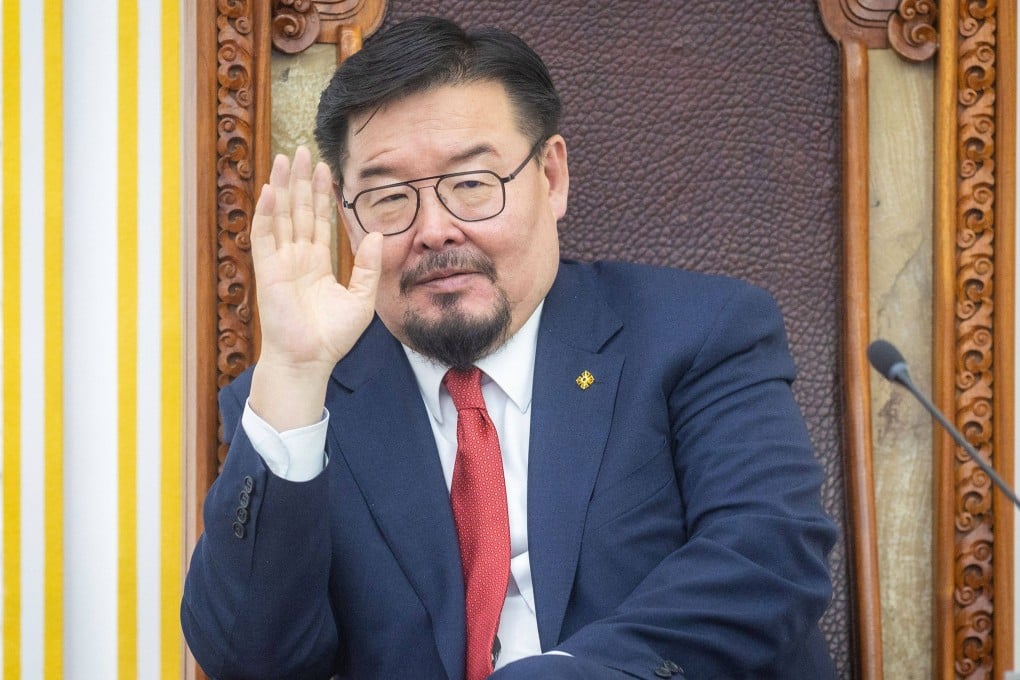 Mongolian Prime Minister Gombojav Zandanshatar gestures as he attends a vote on his dismissal at the parliament in Ulaanbaatar on Friday. Photo: AFP
