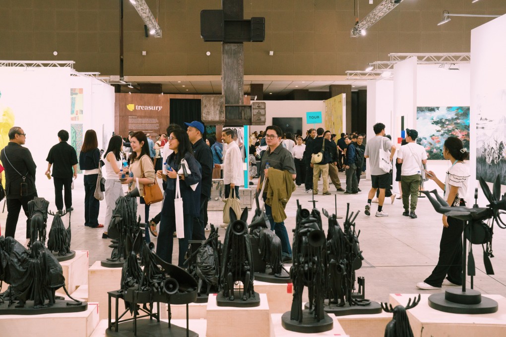 Visitors browse exhibits at 
Art Jakarta 2025, the 15th edition of the fair, held from October 3 to 5. Photo: Joseph Koh