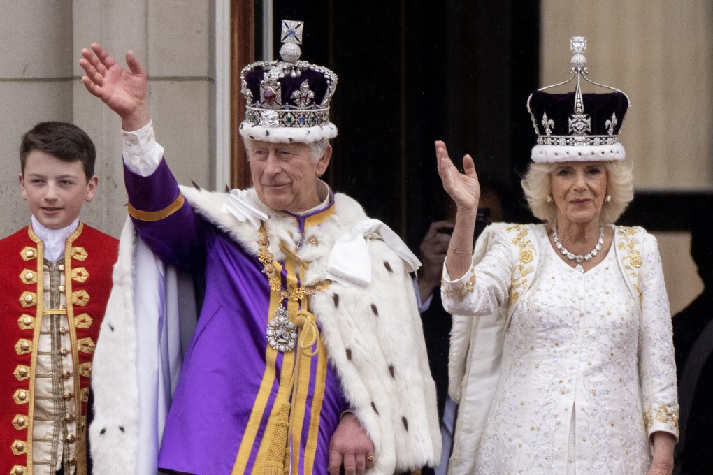 Britain’s King Charles and Queen Camilla wave from the Buckingham Palace balcony during their coronation in London in May 2023. Photo: TNS