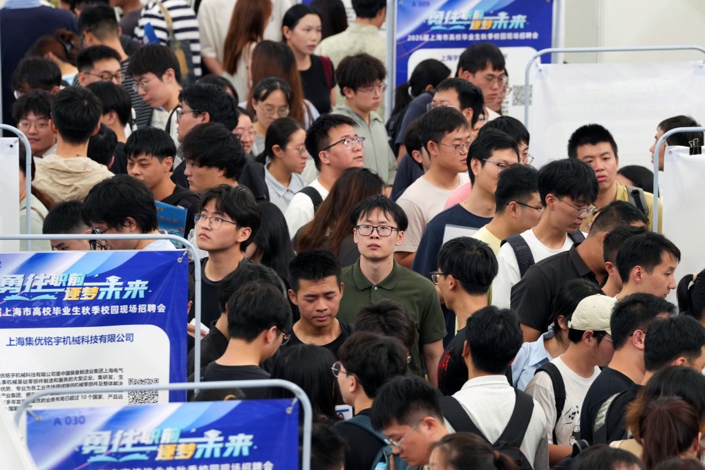 A scene at a job fair for Shanghai University graduates at the Minhang campus of Shanghai Jiao Tong University last month. Statistics show youth unemployment is worryingly high after a bumper crop of university graduates entered the job market in August. Photo: Xinhua
