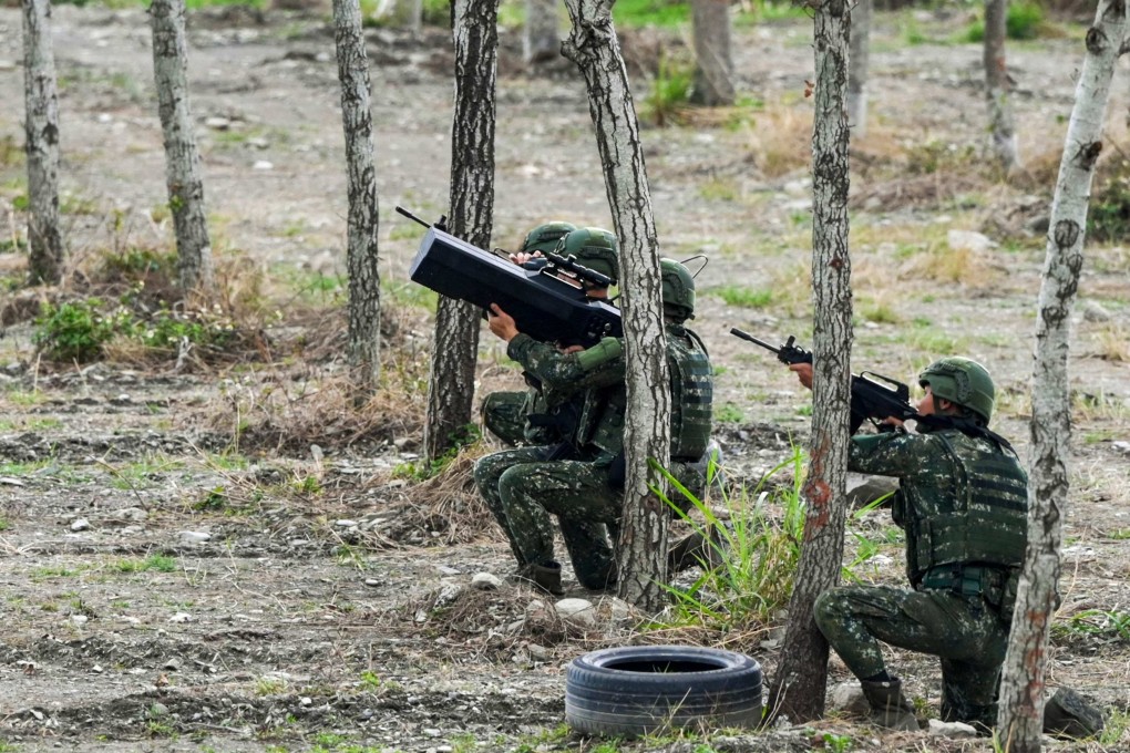 A Taiwanese soldier aims a drone jammer during a training exercise in 2024. Photo: AFP