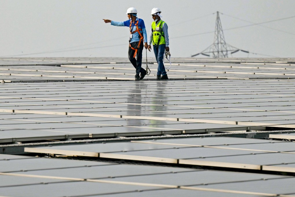 Employees inspect solar panels installed at a food processing plant in Greater Noida. India and Brazil have agreed to raise bilateral trade and expand cooperation in sectors spanning automobiles, IT, clean energy and agriculture. Photo: AFP