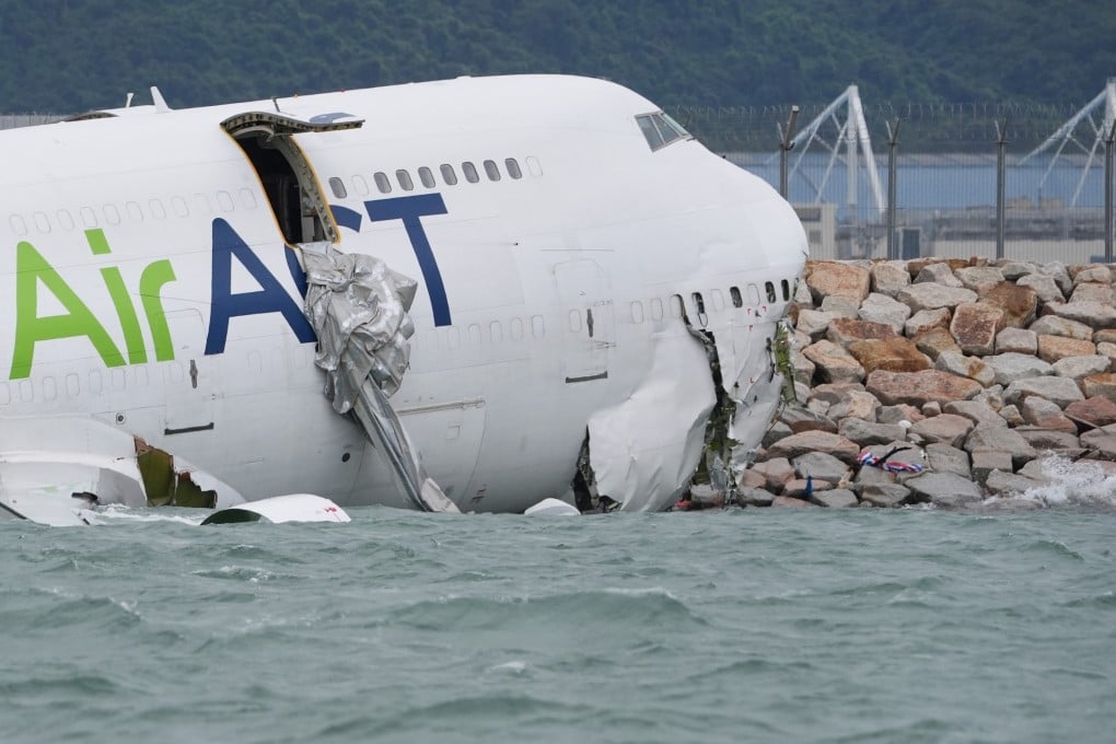 The wreckage of the cargo plane on the shore near Hong Kong International Airport’s north runway. Photo: Elson Li
